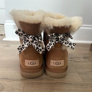 Cheetah bow tie UGGs size 7 barely worn in great condition.